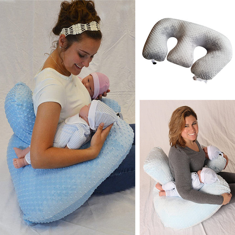Infant Multifunctional Nursing Pillow Cushion in use by a mother with two babies, showcasing U shape and soft fabric design.
